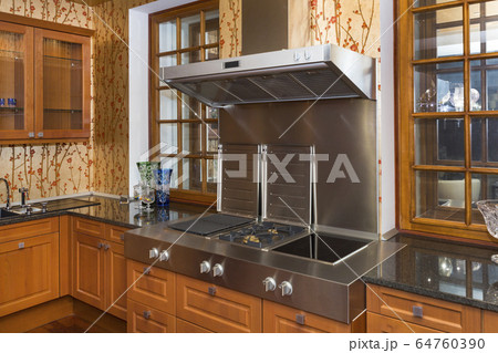 Art nouveau kitchen interior with stove for cooking and cabinets for decoration. Art nouveau kitchen interior with stove for cooking and cabinets for decoration. 64760390