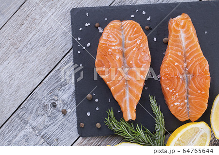 Two fresh raw salmon butterfly steaks Two fresh raw salmon butterfly steaks 64765644