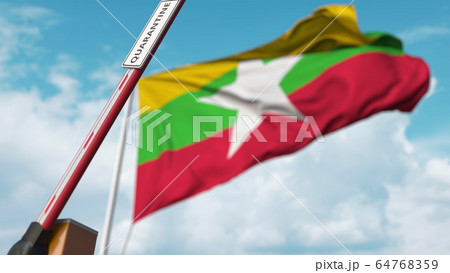Opening boom barrier with QUARANTINE sign against the Myanma flag. Unrestricted entry in Myanmar. 3D rendering 64768359