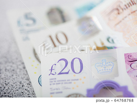 New twenty, ten and five pounds banknotes close up New twenty, ten and five pounds banknotes close up 64768768