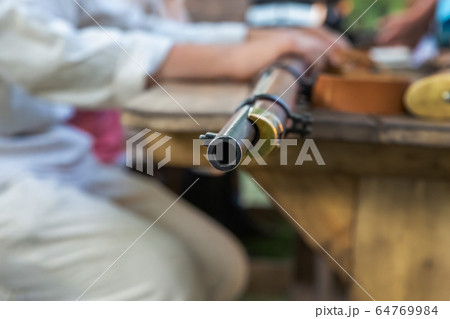 old weapon, long-barreled firearms angle on a old weapon, long-barreled firearms angle on a 64769984