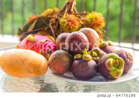 set of asia fruit rambutan, passion fruit, mango 64770190