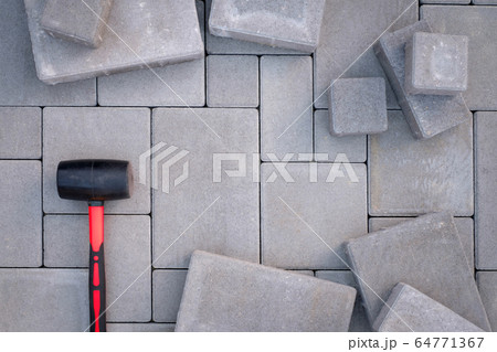 Paving stones paving background 64771367