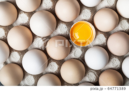 Chicken eggs in organic packaging closeup 64771389