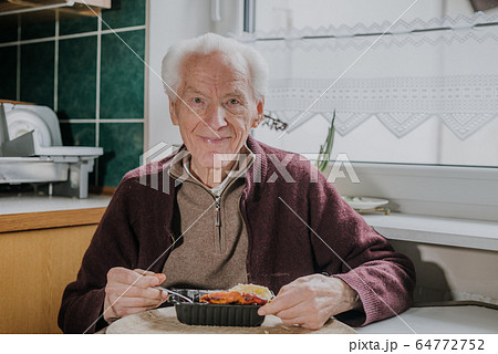 Portrait senior eats dinner at home Portrait senior eats dinner at home 64772752