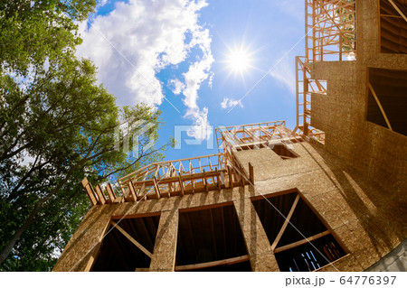 New construction of a house framed of a under 64776397