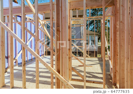 Wood building frame structure on a new development 64777635