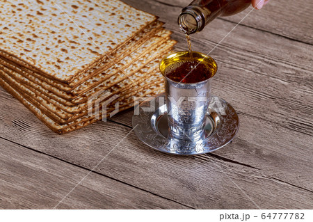 Jewish Pesah celebrating, matzoh and traditional Jewish Pesah celebrating, matzoh and traditional 64777782