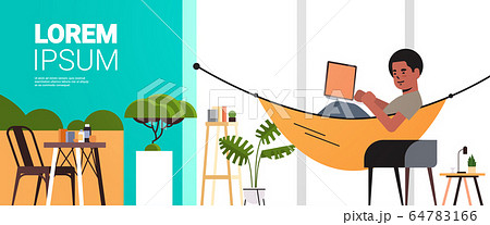 man freelancer using laptop working at home during coronavirus quarantine self-isolation freelance 64783166