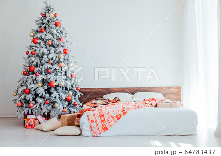 White Christmas tree with red bedroom toys new year winter gifts decor 64783437