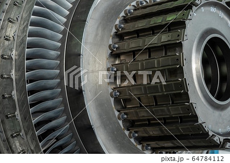 Gas turbine or a jet engine is a power plant of aircraft to fly in the air.Disassembly engine during repair and maintenance. 64784112