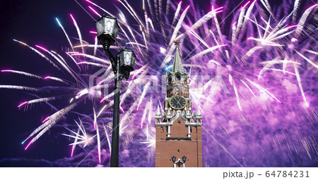 The Spasskaya Tower and fireworks in honor of Victory Day celebration (WWII),  Red Square, Moscow, Russia 64784231