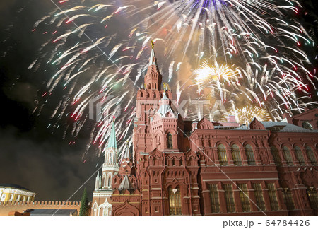 Moscow Kremlin and fireworks in honor of Victory Day celebration (WWII),  Red Square, Moscow, Russia.  64784426