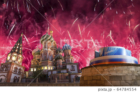 Temple of Basil the Blessed and fireworks in honor of Victory Day celebration (WWII), Moscow, Russia. 64784554