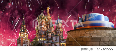 Temple of Basil the Blessed and fireworks in honor of Victory Day celebration (WWII), Moscow, Russia. 64784555