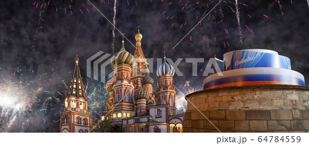 Temple of Basil the Blessed and fireworks in honor of Victory Day celebration (WWII), Moscow, Russia. 64784559
