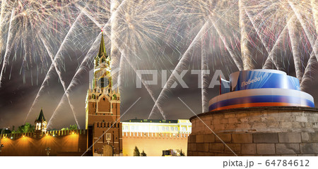 Moscow Kremlin and fireworks in honor of Victory Day celebration (WWII),  Red Square, Moscow, Russia. 64784612