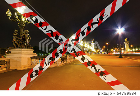 Coronavirus in Paris, France. Concept of COVID pandemic and travel in Europe.  64789834