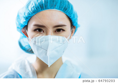 woman doctor wear facial mask woman doctor wear facial mask 64793203