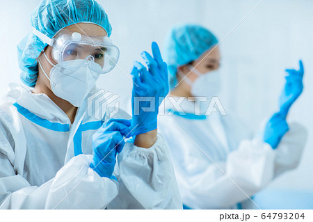 doctors wear protective suits doctors wear protective suits 64793204