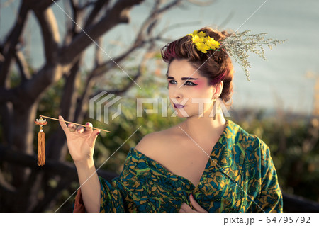 Portrait of a Japanese Geisha in kimono Portrait of a Japanese Geisha in kimono 64795792
