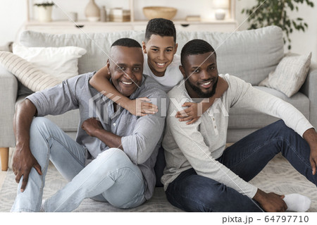 Portrait of happy black multi generation family at home Portrait of happy black multi generation family at home 64797710