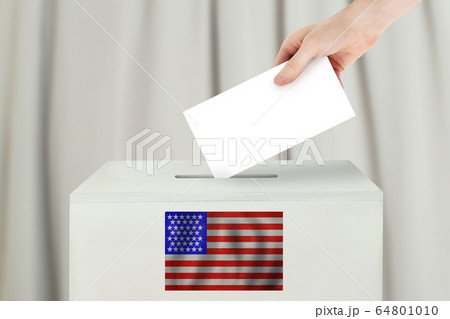 USA Vote concept. Voter hand holding ballot paper USA Vote concept. Voter hand holding ballot paper 64801010