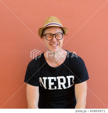 Portrait of stressed young nerd tourist man crying Portrait of stressed young nerd tourist man crying 64804671