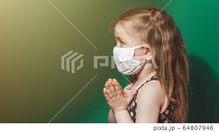Caucasian sick little girl in medical mask during Caucasian sick little girl in medical mask during 64807946
