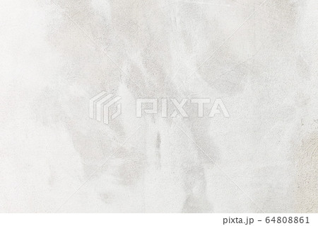 white washed painted concrete wall texture abstract background with brush strokes in gray and black shades. white washed painted concrete wall texture abstract background with brush strokes in gray and black shades. 64808861