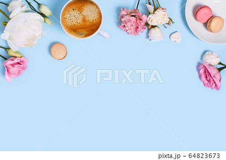 Greeting card with peonies and macaroons. Greeting card with peonies and macaroons. 64823673