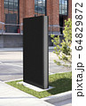 Blank black vertical pylon stand mockup brick building, side view Blank black vertical pylon stand mockup brick building, side view 64829872