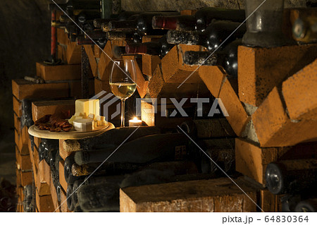 Traditional food in a wine cellar with archival Traditional food in a wine cellar with archival 64830364
