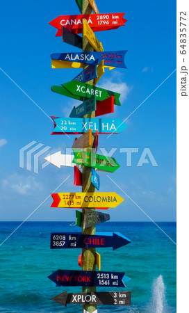 Direction sign in Xcaret near Playa del Carmen, 64835772