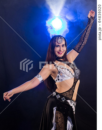 Girl dancing belly dance, fusion or tribal. A...の写真素材