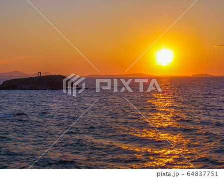 Sunset on Portara - ruins of ancient temple of Sunset on Portara - ruins of ancient temple of 64837751