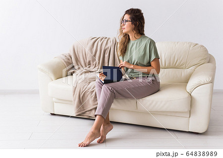 Beautiful girl read book. Concept of relaxation, slow life, hobby, home comfort. Social media, digital detox. Quarantine, self-isolation, social phobia. 64838989