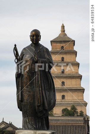 Giant Wild Goose Pagoda and statue of Xuanzang, a seventh-century Buddhist monk, scholar, traveller, and translator , Xi'an, Shaanxi, China Giant Wild Goose Pagoda and statue of Xuanzang, a seventh-century Buddhist monk, scholar, traveller, and translator , Xi'an, Shaanxi, China 64839534