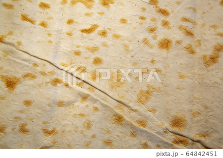 Traditional pita bread. Thin Armenian lavash Traditional pita bread. Thin Armenian lavash 64842451