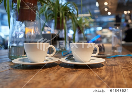 Having a cup of coffee 64843624