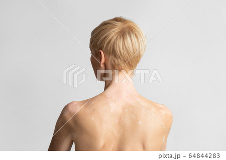 Portrait of european woman posing naked, back 64844283