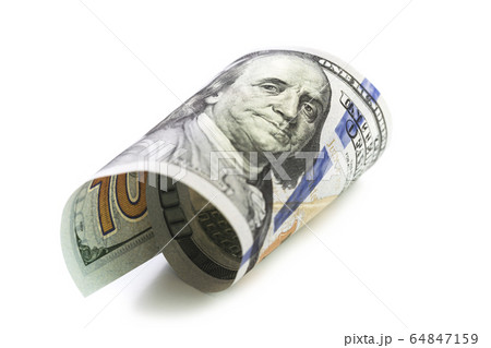 Isolated curled hundred dollars note 64847159