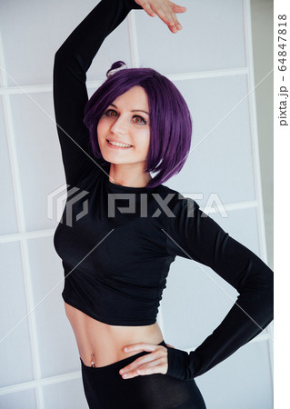woman anime cosplayer with purple japan hair 64847818