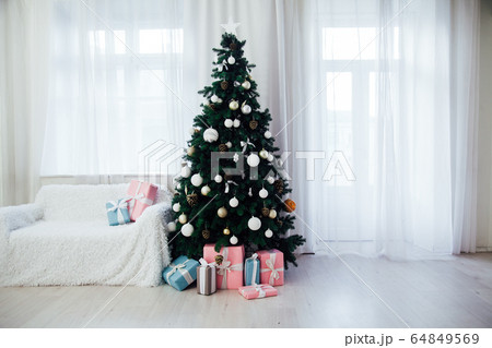 Christmas tree interior presents new year decor festive background 64849569