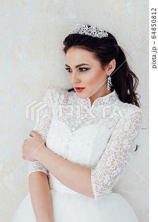 Princess Bride in white wedding dress at the wedding Princess Bride in white wedding dress at the wedding 64850812