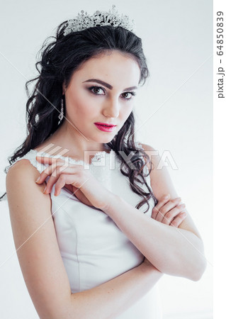 Portrait of bride wedding dress Crown curls hairstyle 64850839