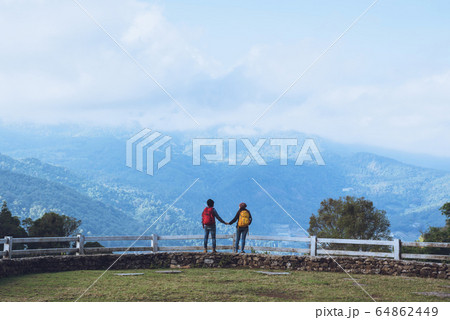 Couples travel nature at sheep farm at Doi Pha Tang, Doi Inthanon National Park Couples travel nature at sheep farm at Doi Pha Tang, Doi Inthanon National Park 64862449