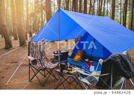 camping tent, Nature tourism, camping in the middle of the pine forest. camping tent, Nature tourism, camping in the middle of the pine forest. 64863428