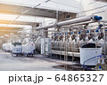 Textile Manufacturing. Circular knitted fabric. Textile factory in spinning production line and a rotating machinery and equipment production company. Clothing industry. Manufacturing textile fabrics. 64865327