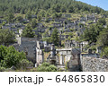 Ghost Town, Abandoned houses and ruins of Kayakoy village, Fethiye, Turkey 64865830